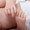 Jucarie Bebelusa cu bentita alba si botosei
